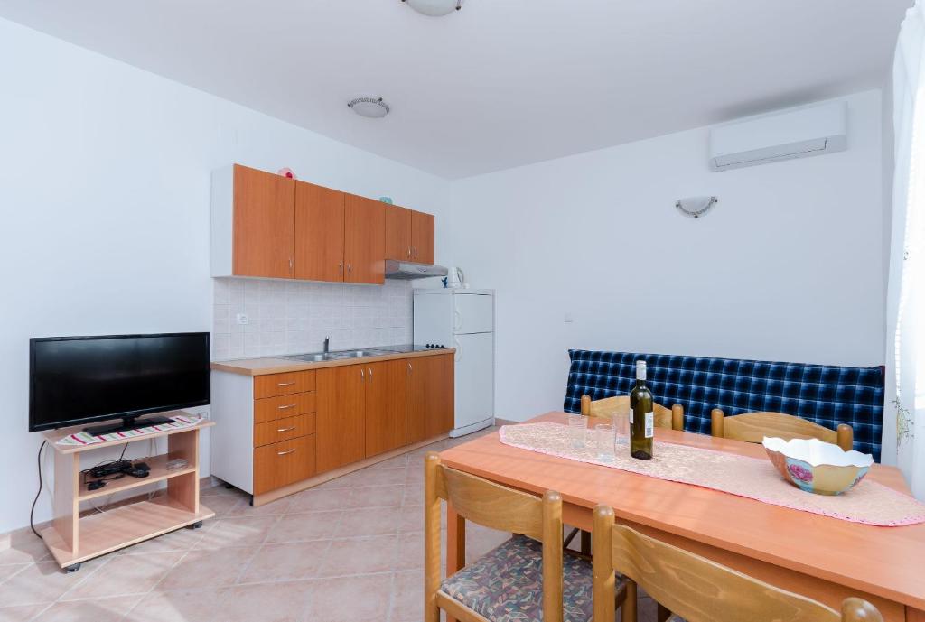 Kuchyňa alebo kuchynka v ubytovaní Apartments Alex