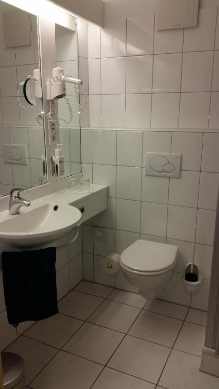 Koupelna v ubytování Hotel Aquamarin