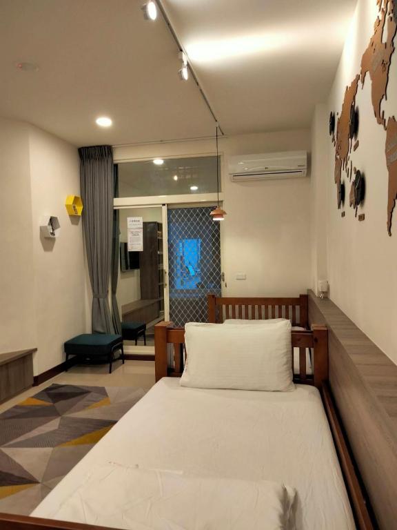 Postel nebo postele na pokoji v ubytování 910 Hostel (Chengdong)