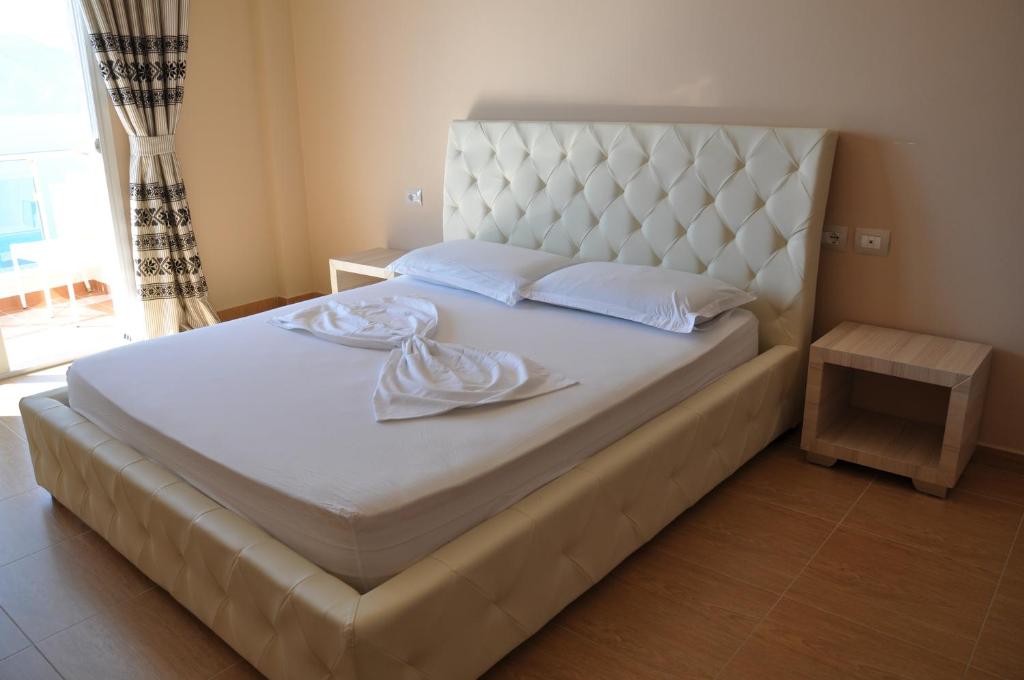 Postel nebo postele na pokoji v ubytování Coral Hotel & Resort