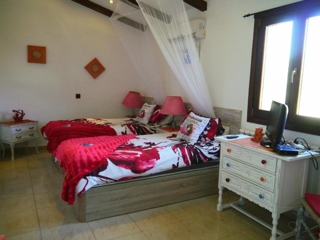 Postel nebo postele na pokoji v ubytování Villa Miramar