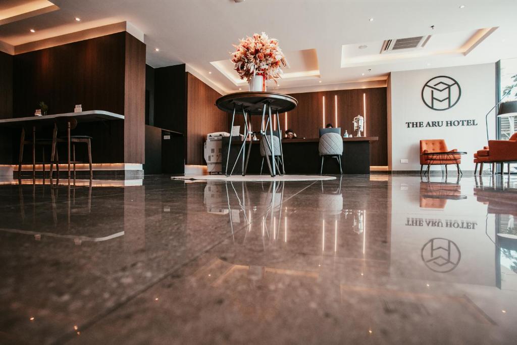 Vstupní hala nebo recepce v ubytování The Aru Hotel at Aru Suites