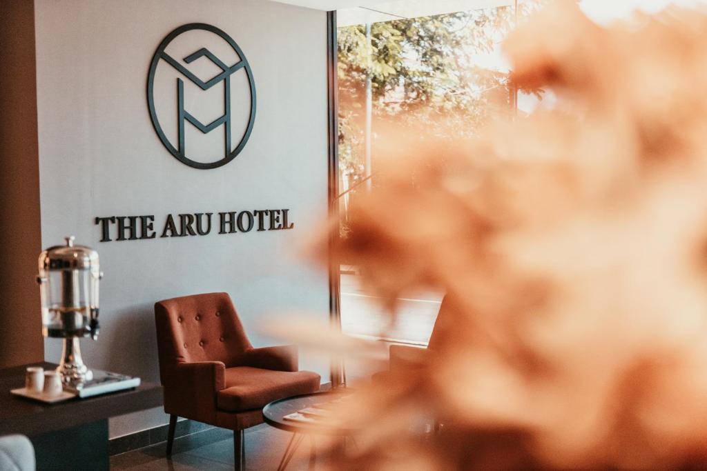 Posezení v ubytování The Aru Hotel at Aru Suites