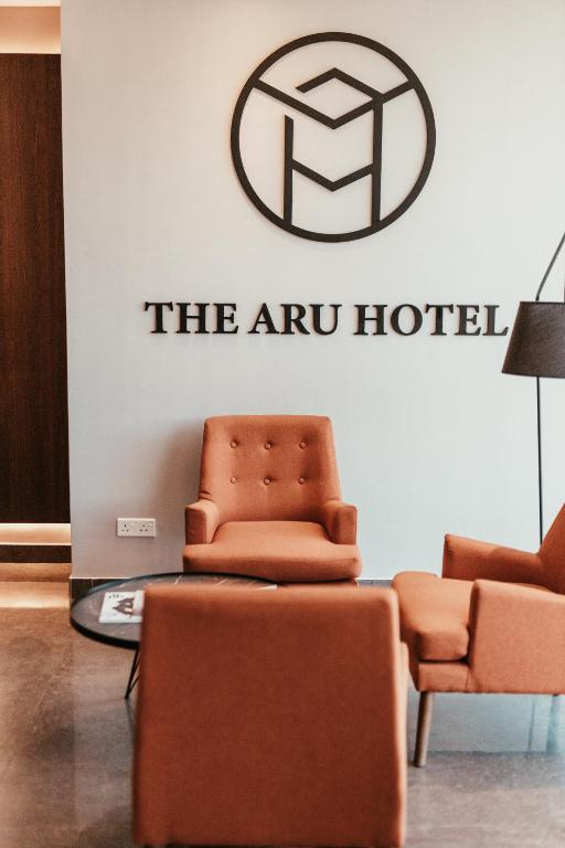 Posezení v ubytování The Aru Hotel at Aru Suites