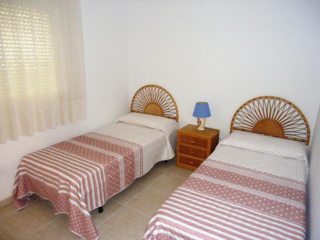 Postel nebo postele na pokoji v ubytování Arabella duplex village