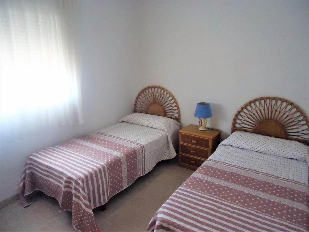 Postel nebo postele na pokoji v ubytování Arabella duplex village