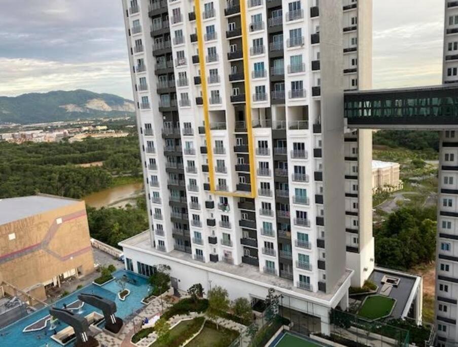 an aerial view of a large building with a pool at Skynature@Mesahill-Nature view-Poolview-Fast Wifi in Nilai