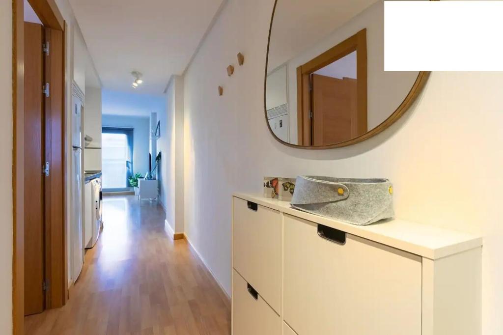 A kitchen or kitchenette at apartamento la rosaleda