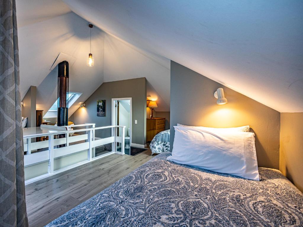 Postel nebo postele na pokoji v ubytování Rivendell - Horopito Holiday Home