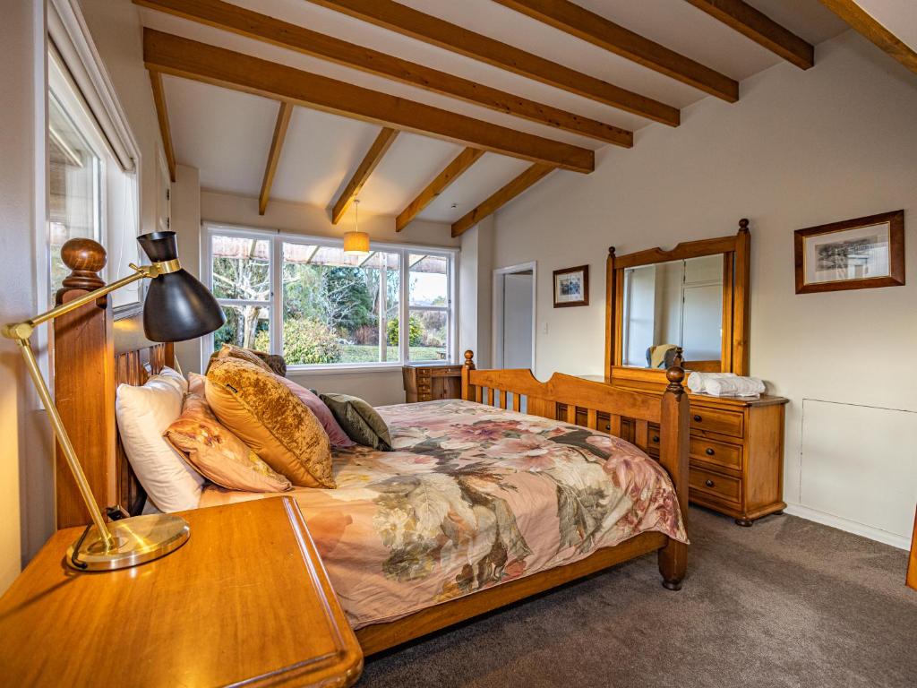 Postel nebo postele na pokoji v ubytování Rivendell - Horopito Holiday Home