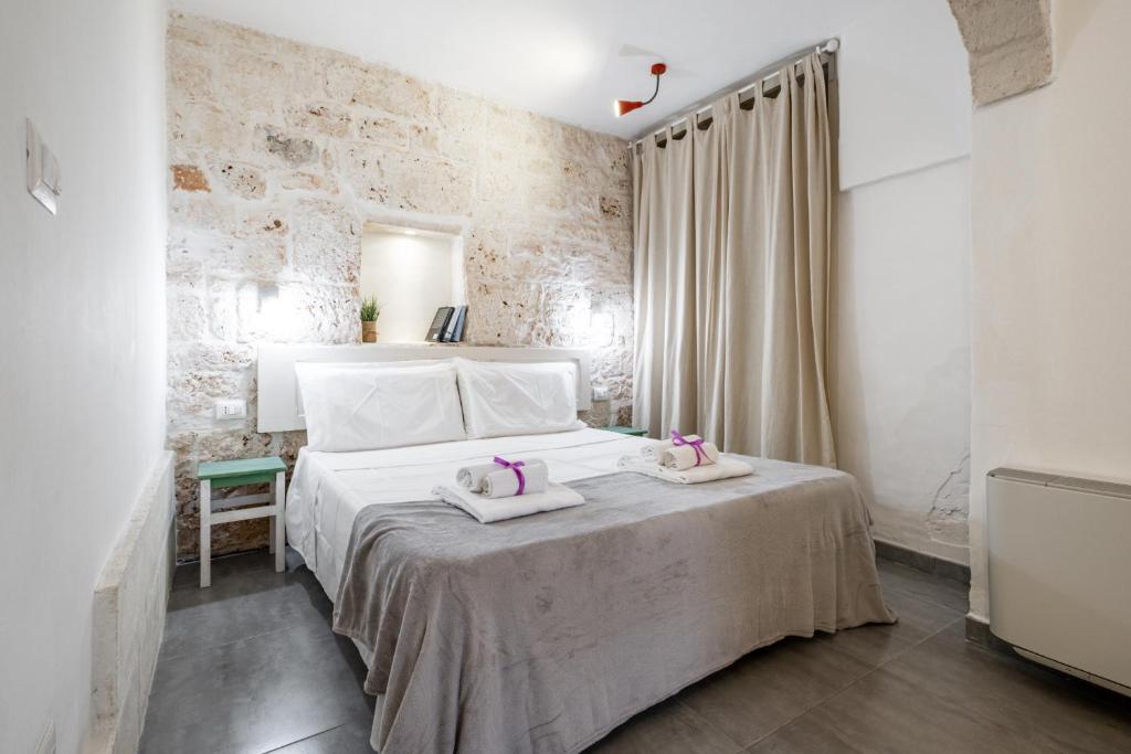 Posteľ alebo postele v izbe v ubytovaní La Casa nel Vico Pretty Apartment