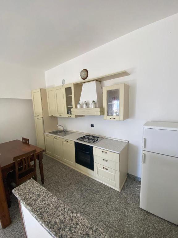 Kuchyň nebo kuchyňský kout v ubytování Hotel Leopold