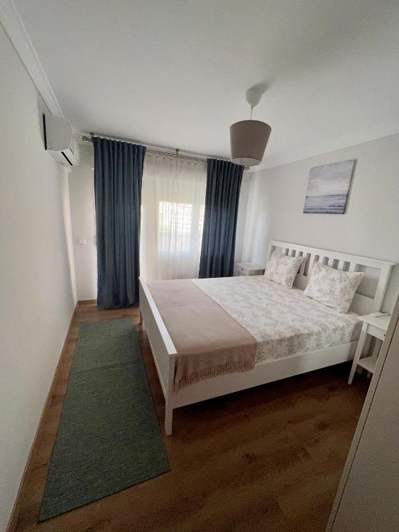 Posteľ alebo postele v izbe v ubytovaní Apartamentos Prestige Suites Málaga II