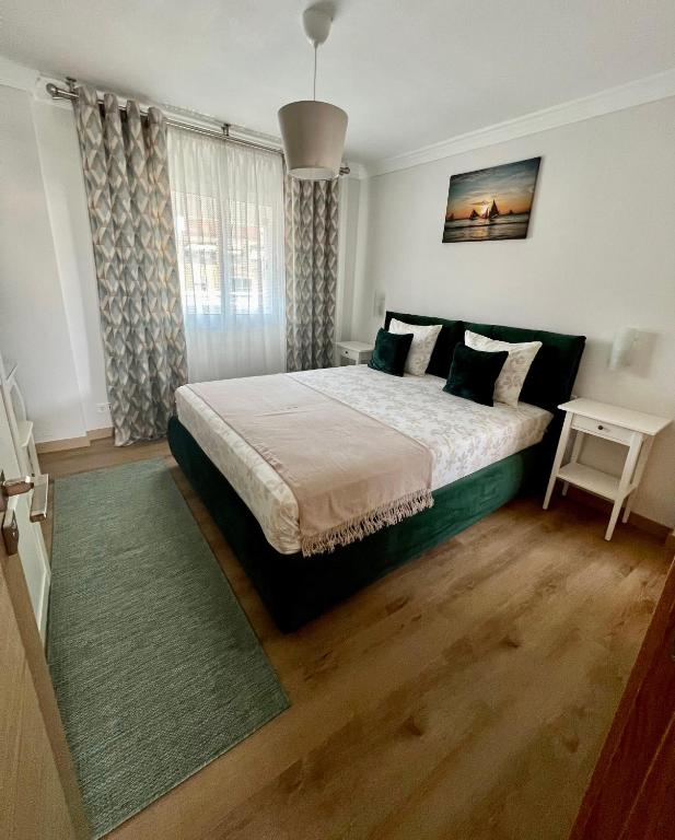 Posteľ alebo postele v izbe v ubytovaní Apartamentos Prestige Suites Málaga II
