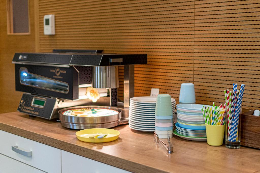 Kuchnia lub aneks kuchenny w obiekcie Pangea Hotel