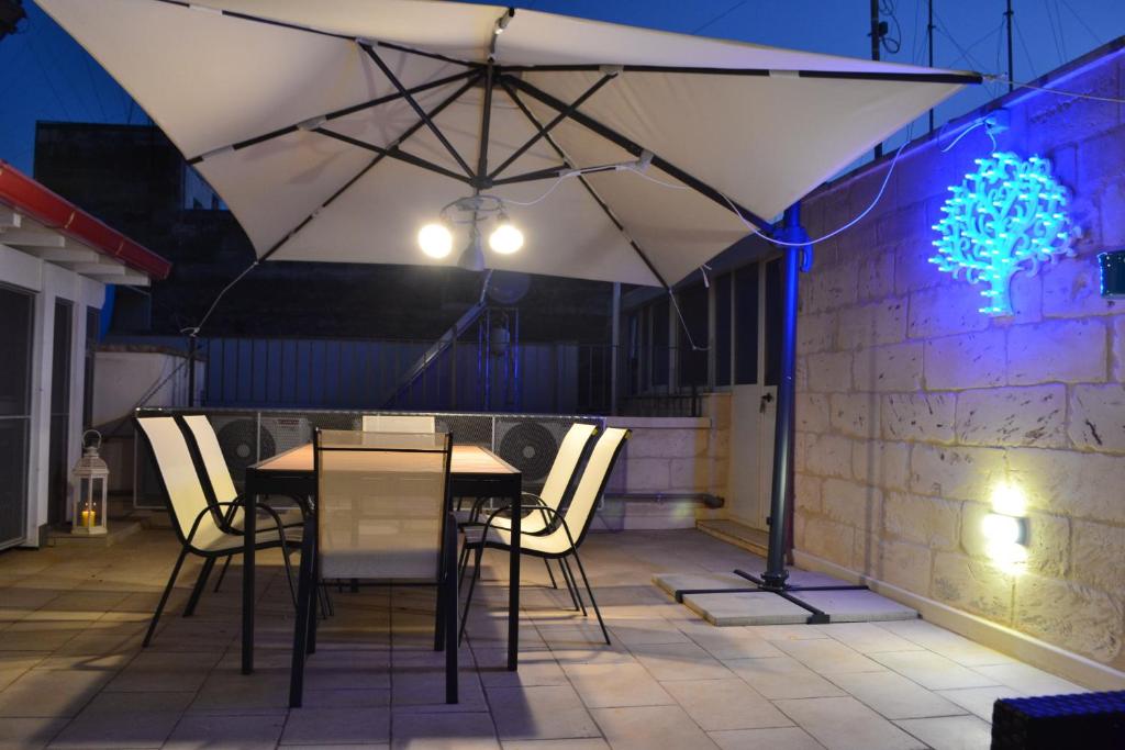 Patio lub wspólna przestrzeń na świeżym powietrzu w obiekcie La Fitolacca B&B