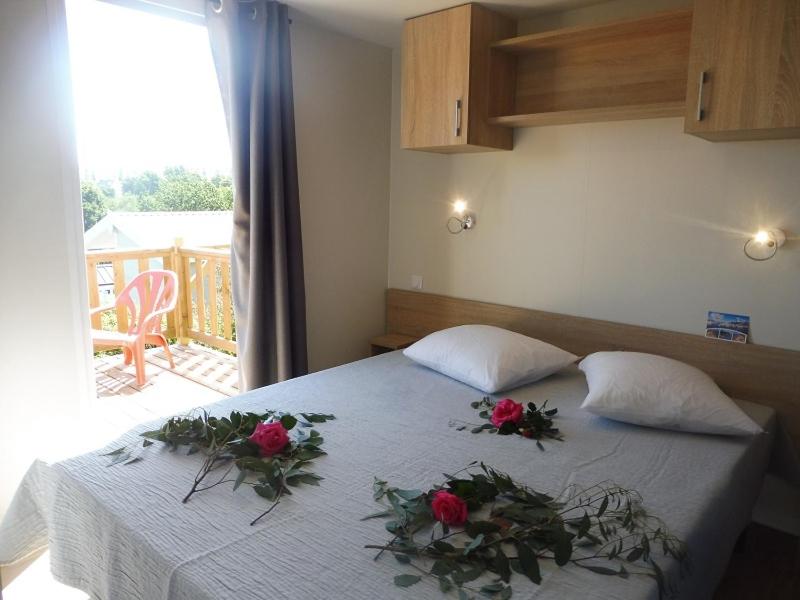 Postel nebo postele na pokoji v ubytování Camping de Trezulien