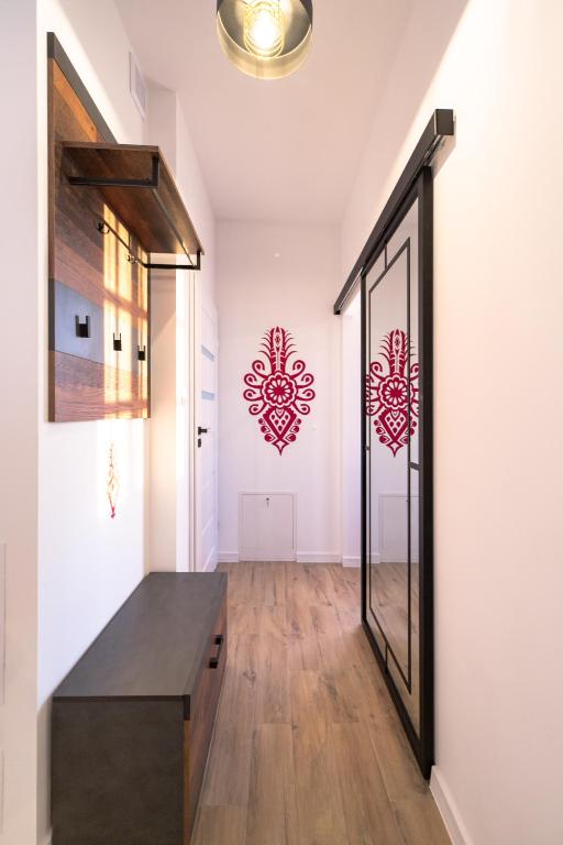 Kuchyňa alebo kuchynka v ubytovaní Apartament Liściasty 1 z tarasem - Dream Apart