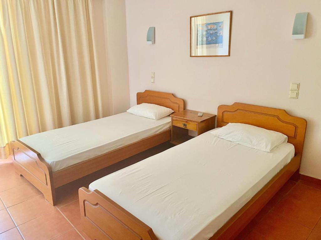 Postel nebo postele na pokoji v ubytování Klitemnistra Rooms