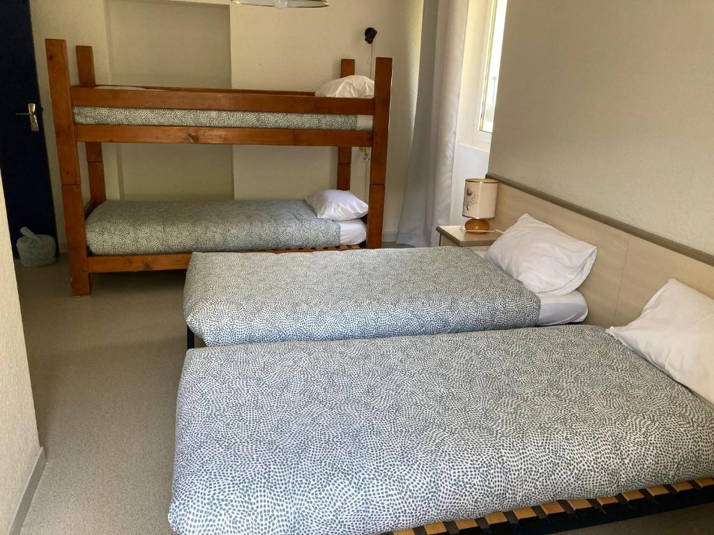 Postel nebo postele na pokoji v ubytování Le Jorjane