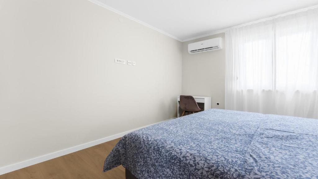 Posteľ alebo postele v izbe v ubytovaní Casa Adua