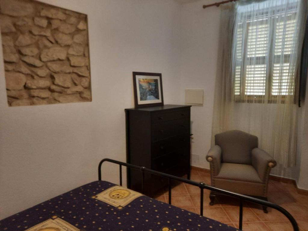 Postel nebo postele na pokoji v ubytování Ca´n Buniferri