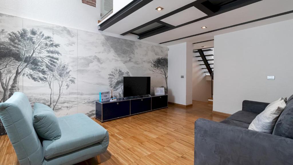 A television and/or entertainment centre at Italianway - Frisi 8