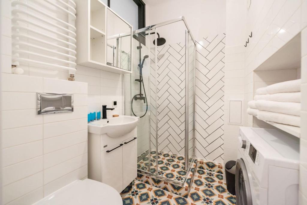 Kúpeľňa v ubytovaní Metro Plac Wilsona Etno Apartament