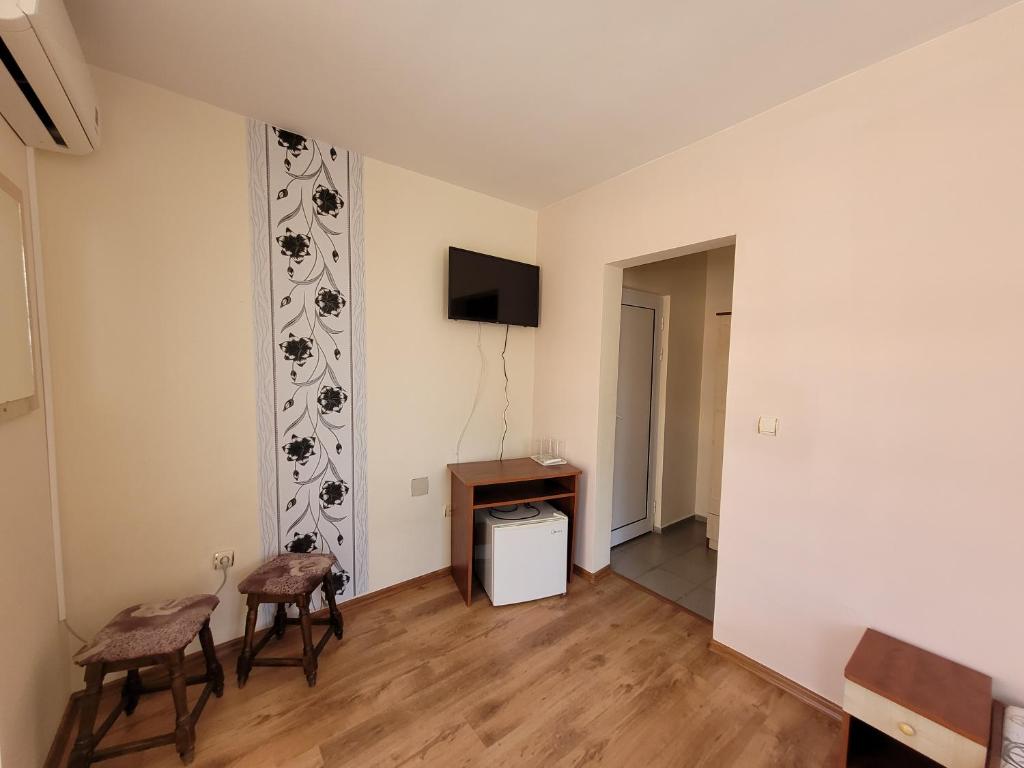 TV a/nebo společenská místnost v ubytování Guesthouse Iceberg