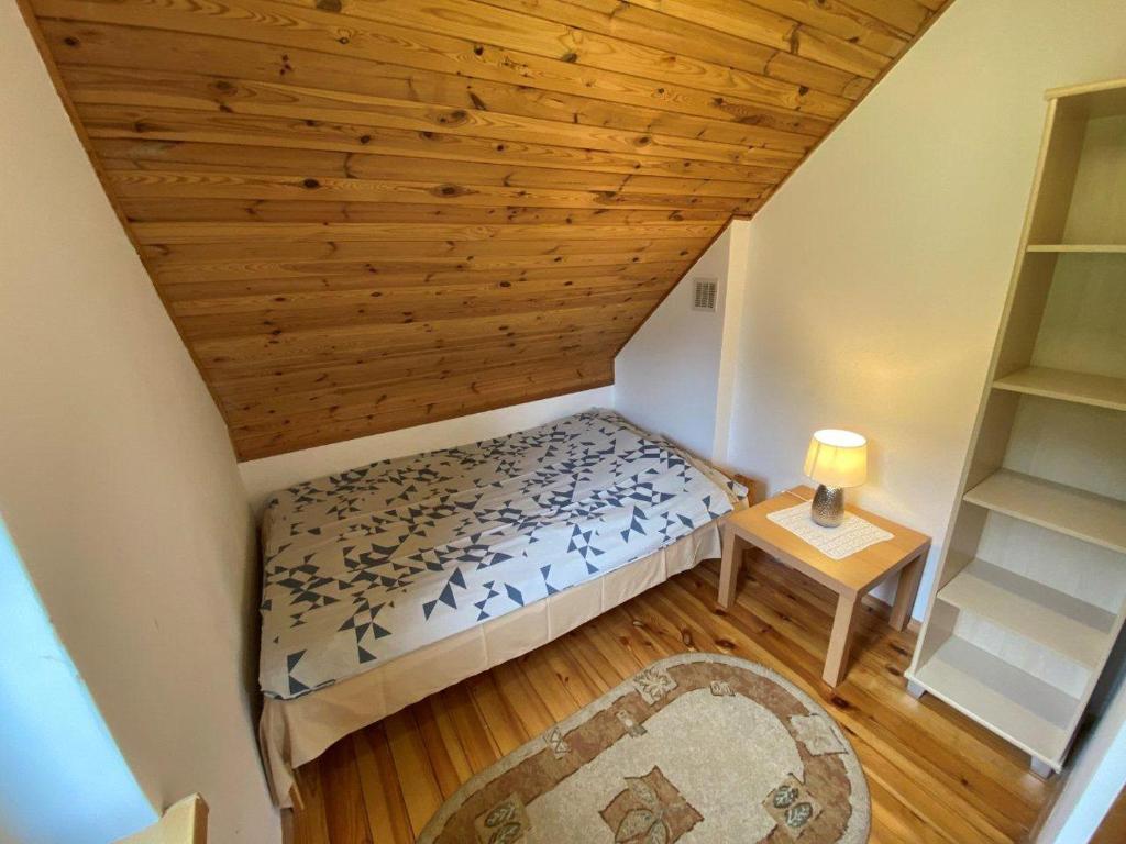 Letto o letti in una camera di Bociani Domek