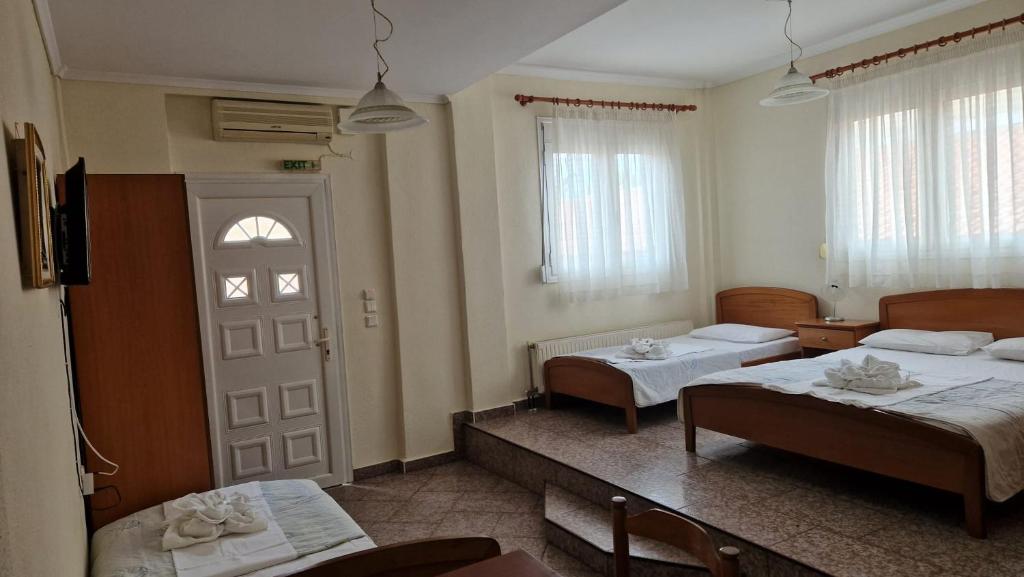 Łóżko lub łóżka w pokoju w obiekcie villa panorama