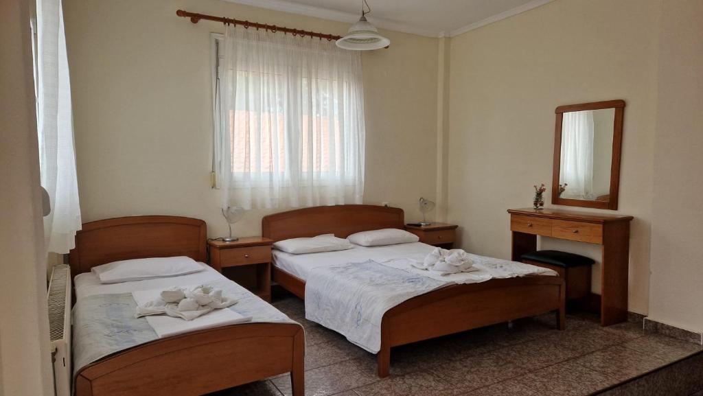 Łóżko lub łóżka w pokoju w obiekcie villa panorama