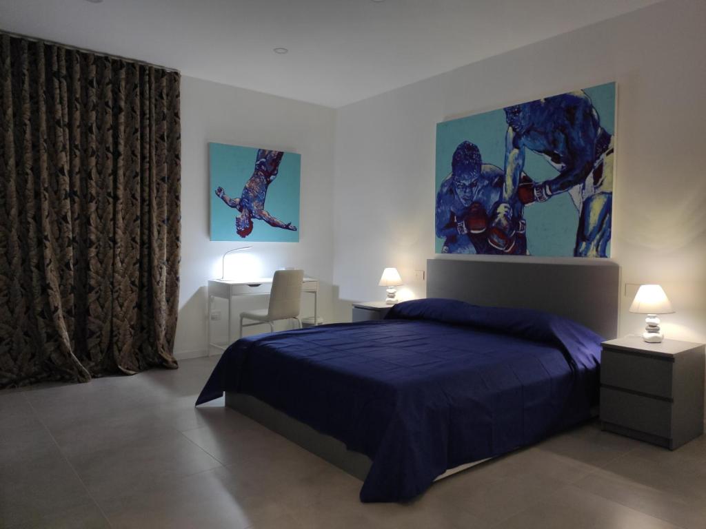 Postel nebo postele na pokoji v ubytování GArt Riviera B&B