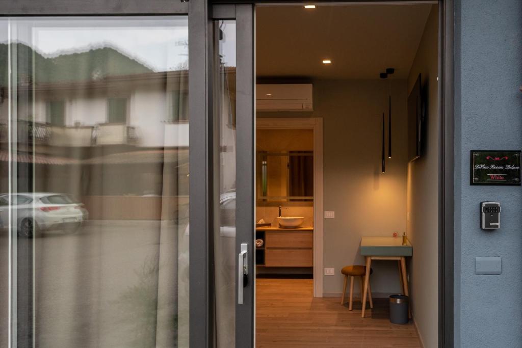 Fotografie z fotogalerie ubytování DiVino Rooms Deluxe v destinaci Sabbio Chiese