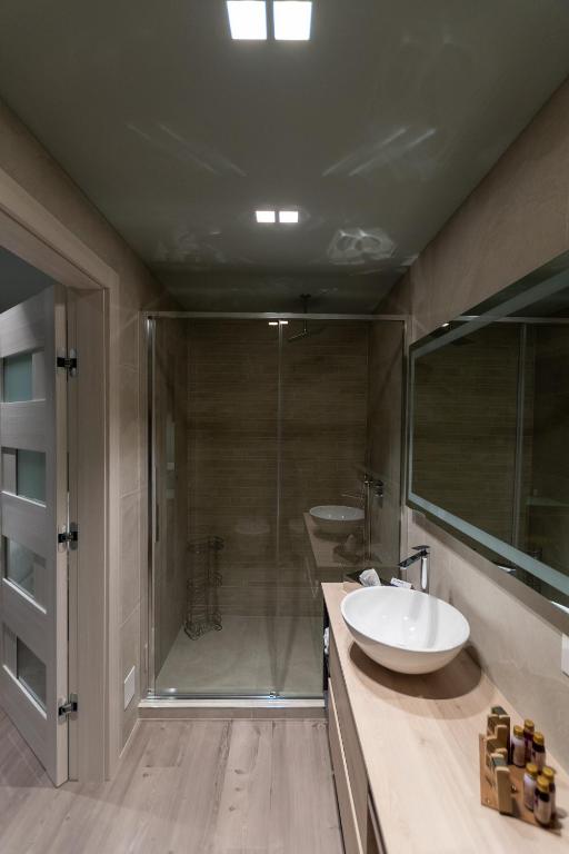 Koupelna v ubytování DiVino Rooms Deluxe