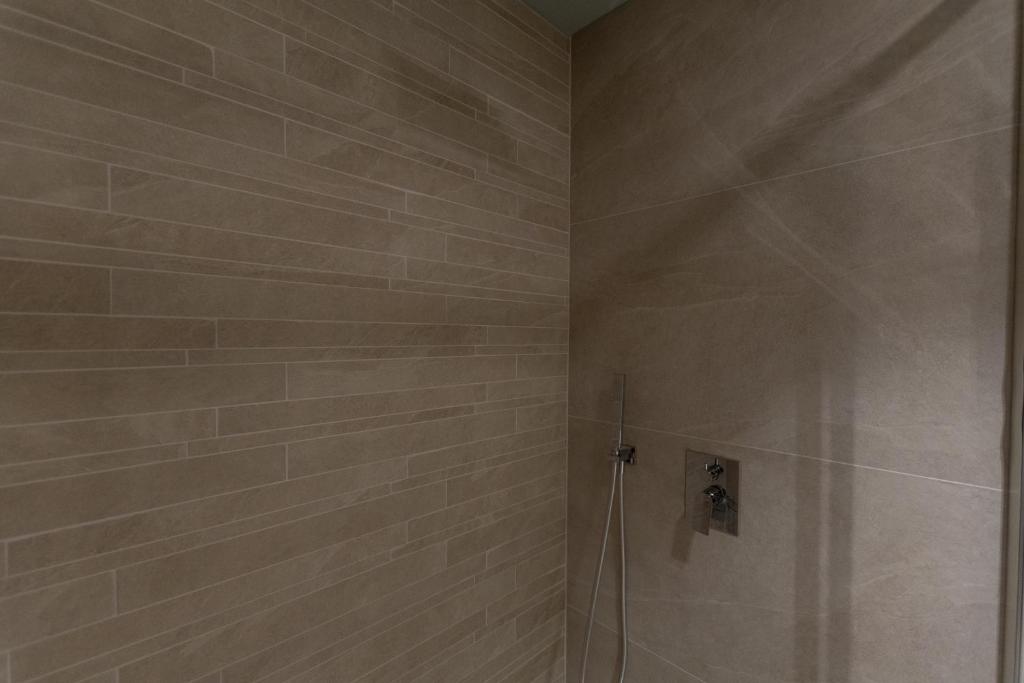 Koupelna v ubytování DiVino Rooms Deluxe