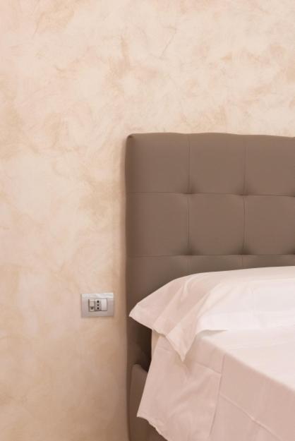 A bed or beds in a room at TOLEDO HOME 116