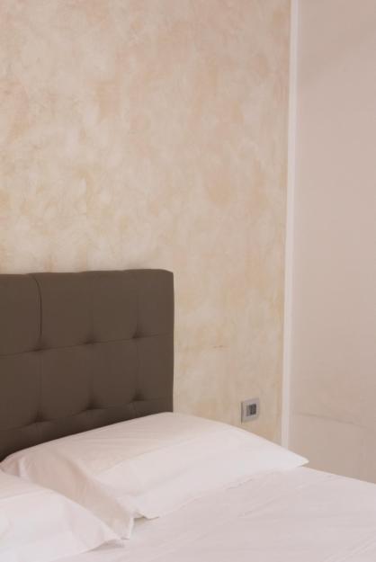 A bed or beds in a room at TOLEDO HOME 116