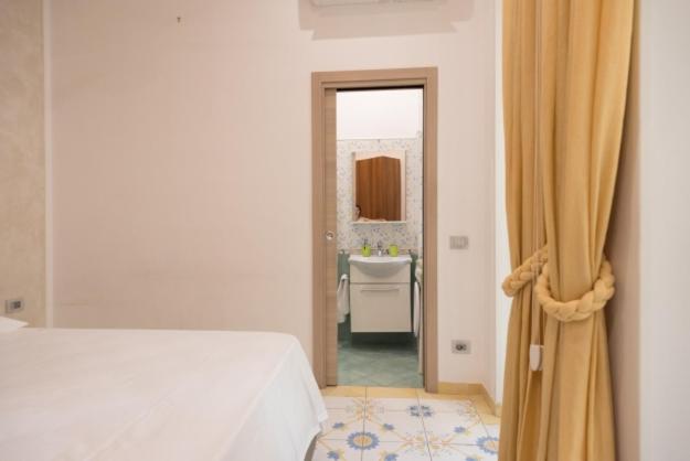 A bed or beds in a room at TOLEDO HOME 116