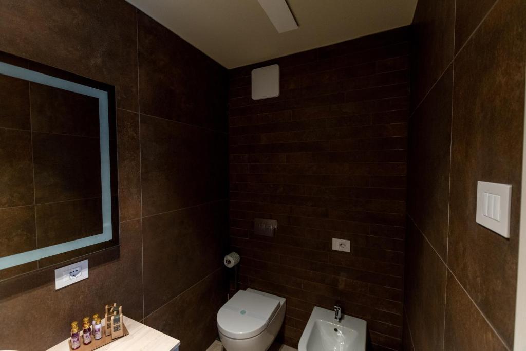 Koupelna v ubytování DiVino Rooms Deluxe