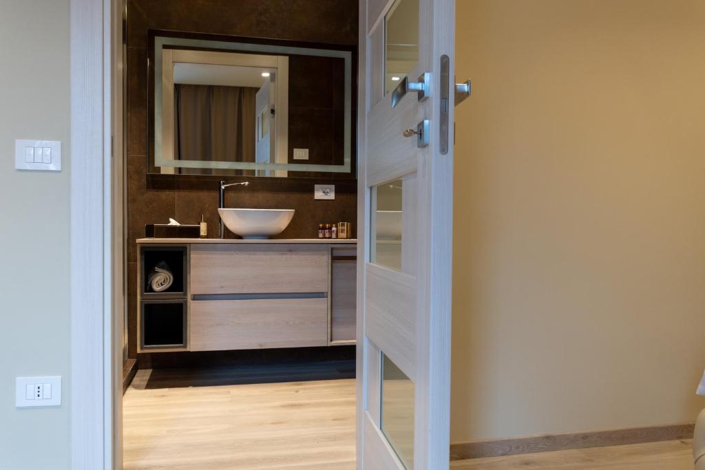 Koupelna v ubytování DiVino Rooms Deluxe