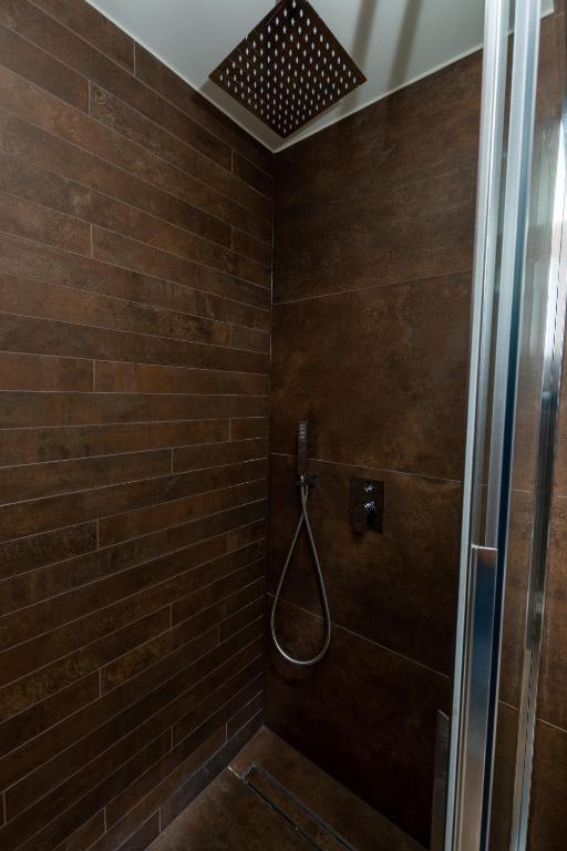 Koupelna v ubytování DiVino Rooms Deluxe