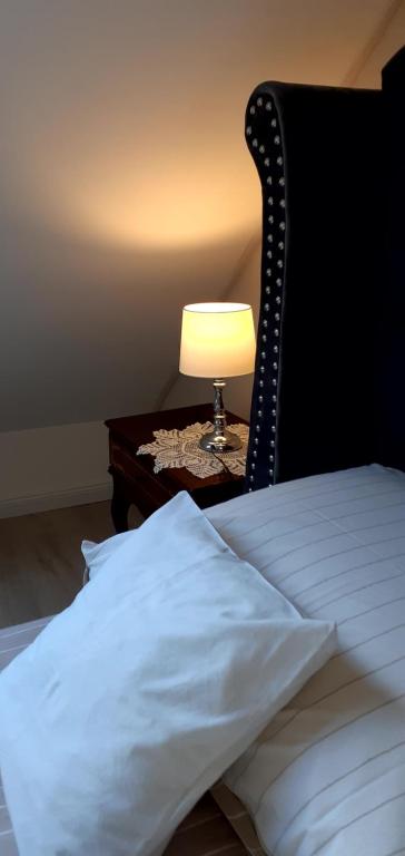 Postel nebo postele na pokoji v ubytování Lux Apartman Villa