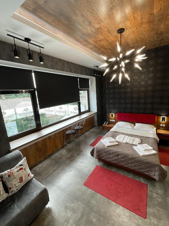 Postel nebo postele na pokoji v ubytování Levanevsky Hotel