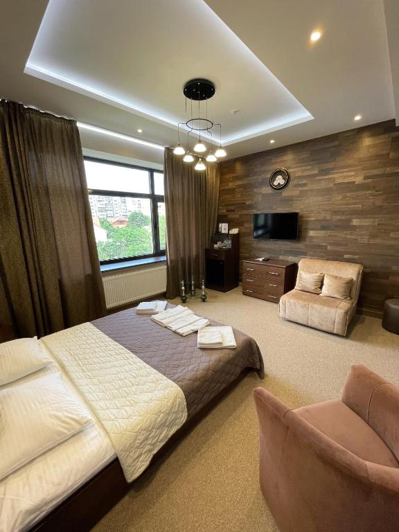 Postel nebo postele na pokoji v ubytování Levanevsky Hotel