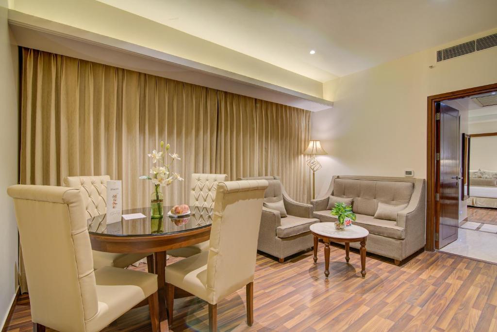 Posezení v ubytování Hotel Home In By Amrik Sukhdev