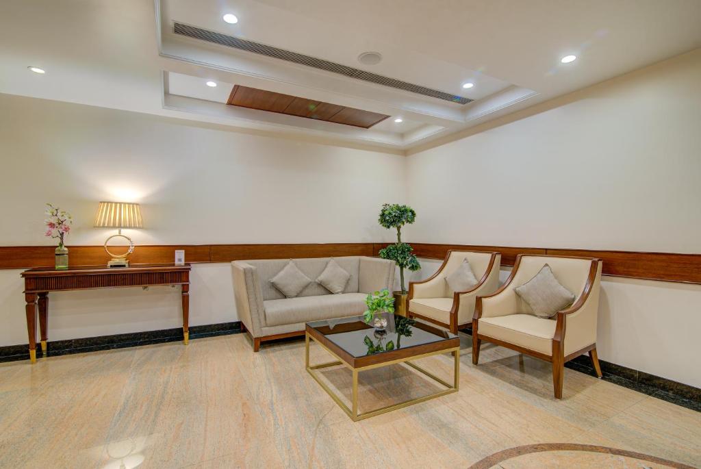 Posezení v ubytování Hotel Home In By Amrik Sukhdev