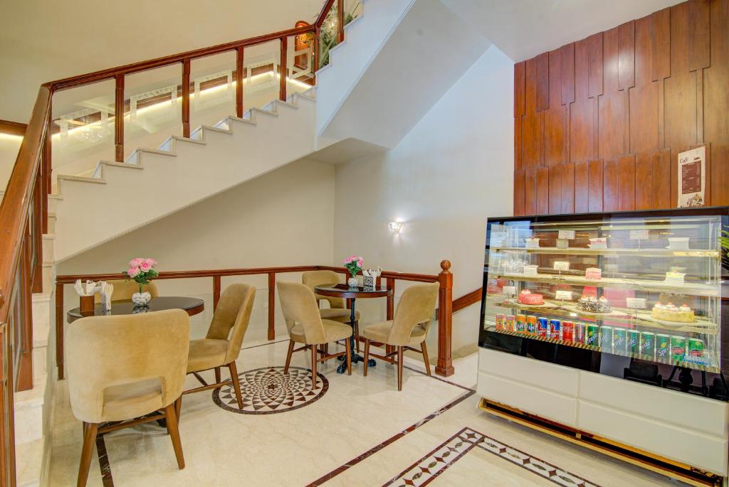 Posezení v ubytování Hotel Home In By Amrik Sukhdev