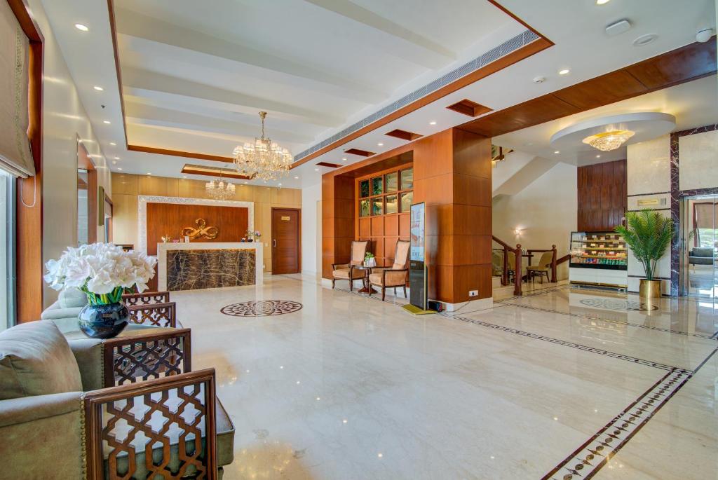 Posezení v ubytování Hotel Home In By Amrik Sukhdev