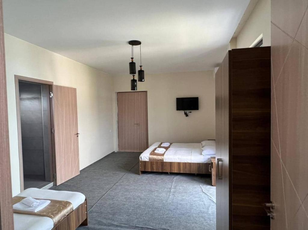 Postel nebo postele na pokoji v ubytování Guest House Nikola